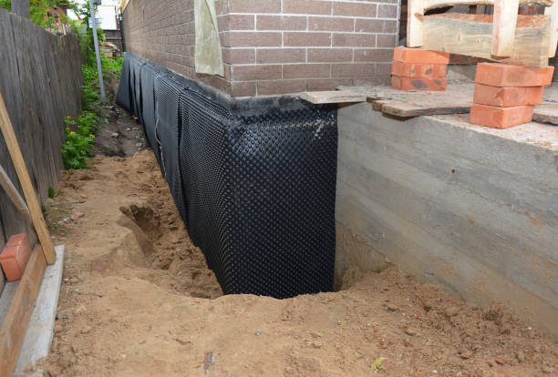 Happy homeowners after waterproofing job in Pall Mall